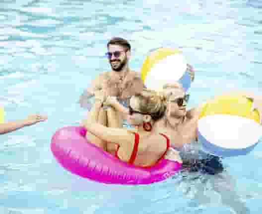 Residents in the pool at Identity Miami