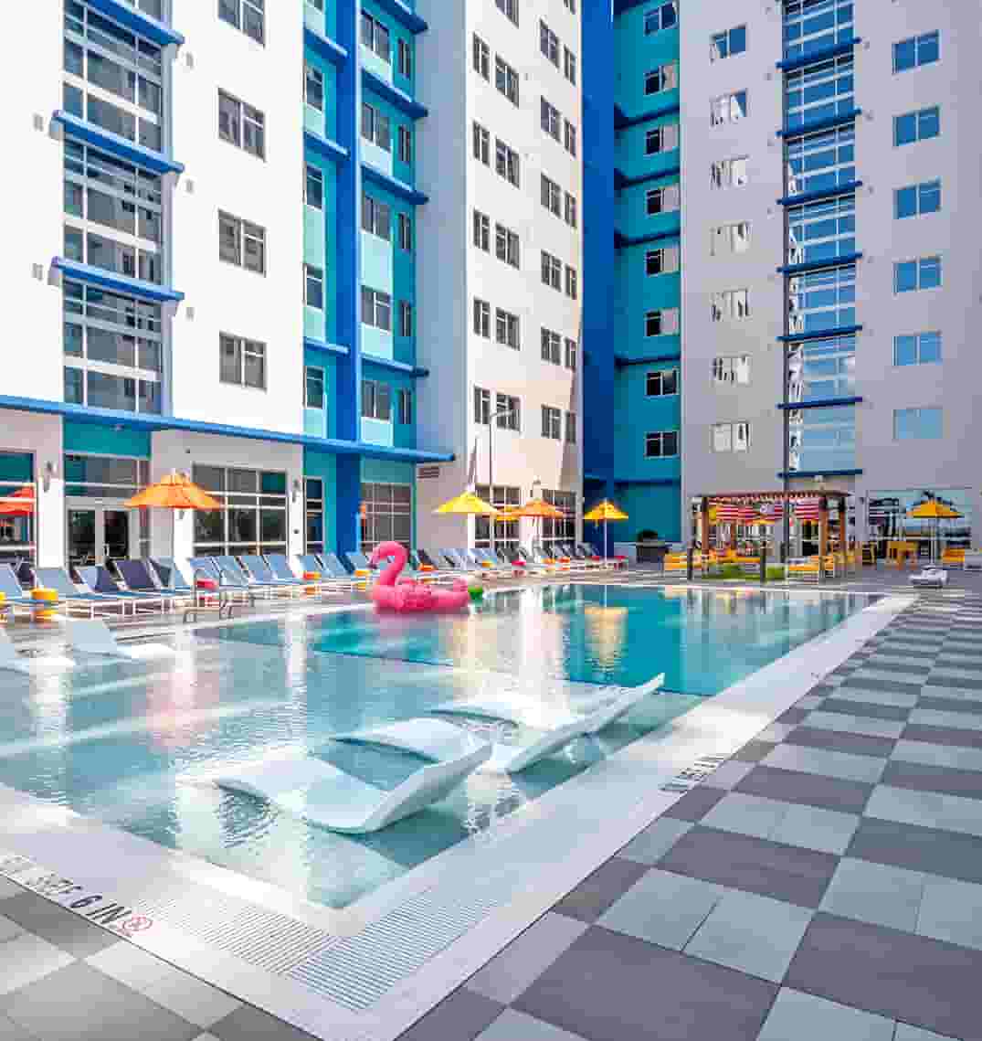 Identity Miami sun deck with pool and cabanas near FIU