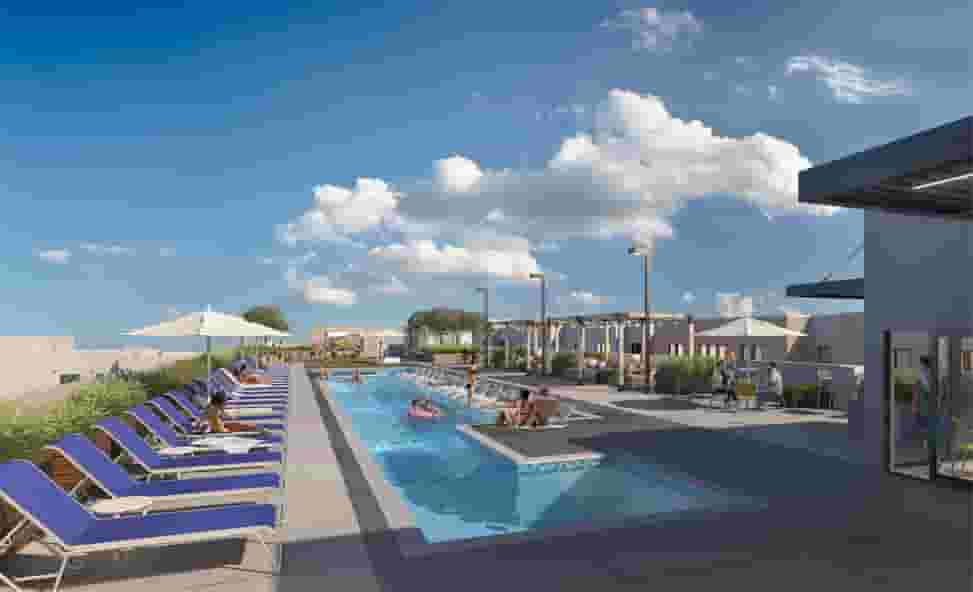 The Jolly Roger residents soaking in the sun in the community rooftop pool