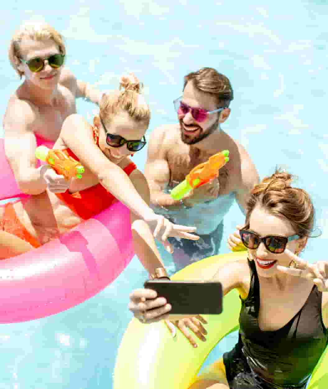 Student residents taking a selfie while in the Rooftop Pool