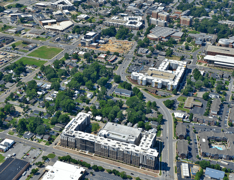 Aerial view of The Jolly Roger with ECU campus visible in background
