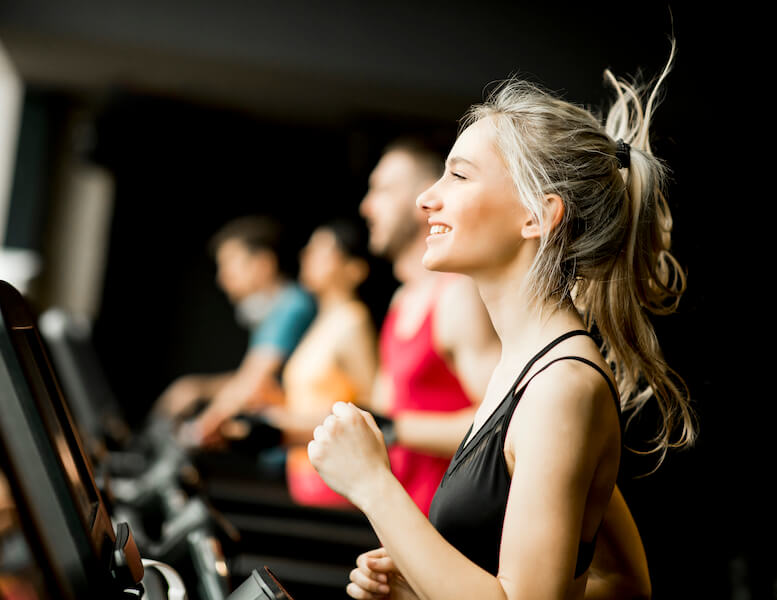 The Jolly Roger resident running on a treadmill in the Fitness Center