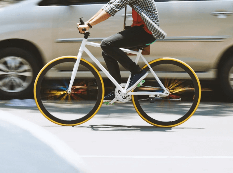 Resident biking through Downtown Evanston