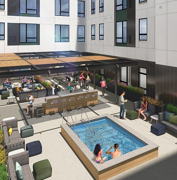 Aerial View of Courtyard with Hot Tub, TVs, Grills, and Lounge